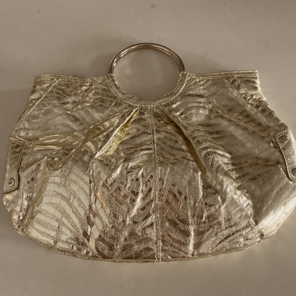 Express gold clutch handbag
